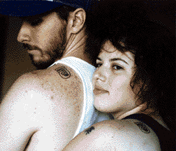 Chris & Rae with matching tattoos